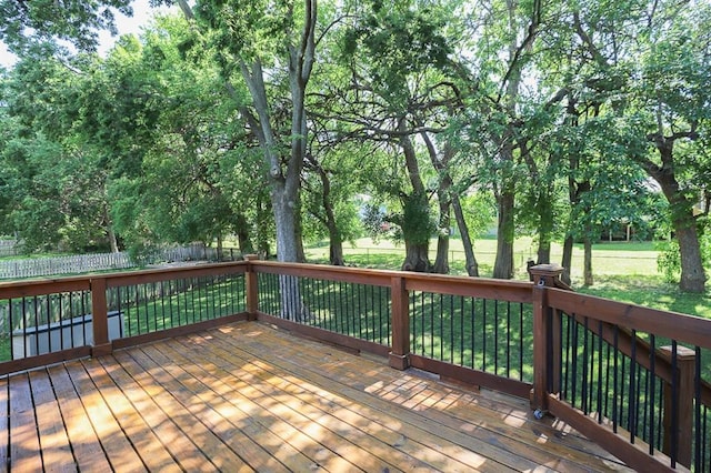 311 NE Bridge Pl, Blue Springs, MO 64014 - deck with a fenced backyard