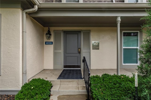10734 Glenwood St Unit A, Overland Park, KS 66211 - entrance to property with stucco siding