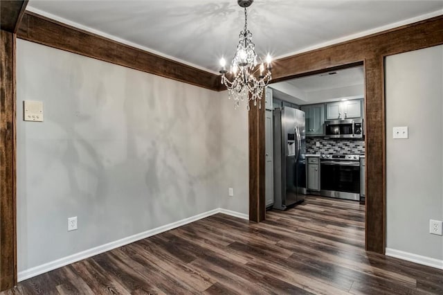 10734 Glenwood St Unit A, Overland Park, KS 66211 - unfurnished dining area featuring dark wood-style flooring and a chandelier