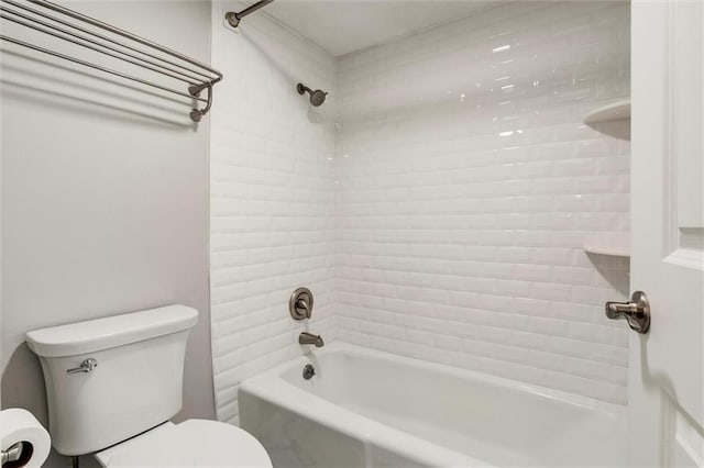 10734 Glenwood St Unit A, Overland Park, KS 66211 - bathroom featuring toilet and tub / shower combination