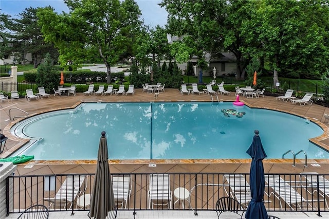 10734 Glenwood St Unit A, Overland Park, KS 66211 - community pool featuring a patio area