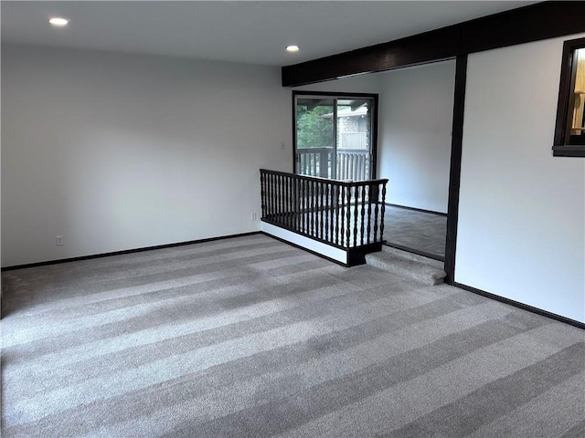 423 W 104th St Unit C, Kansas City, MO 64114 - carpeted empty room with recessed lighting and baseboards