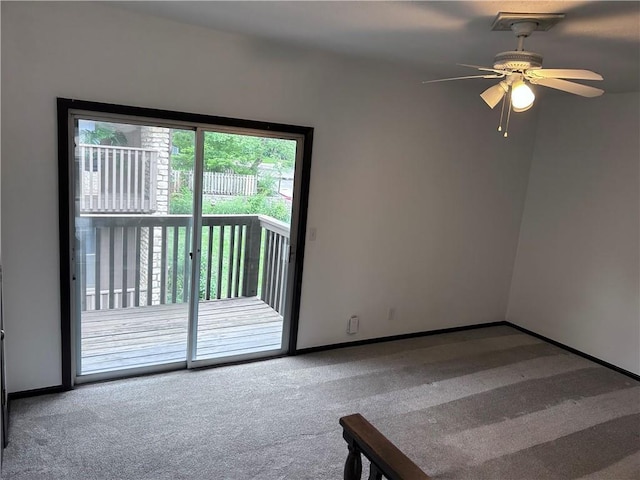 423 W 104th St Unit C, Kansas City, MO 64114 - carpeted empty room with ceiling fan and baseboards