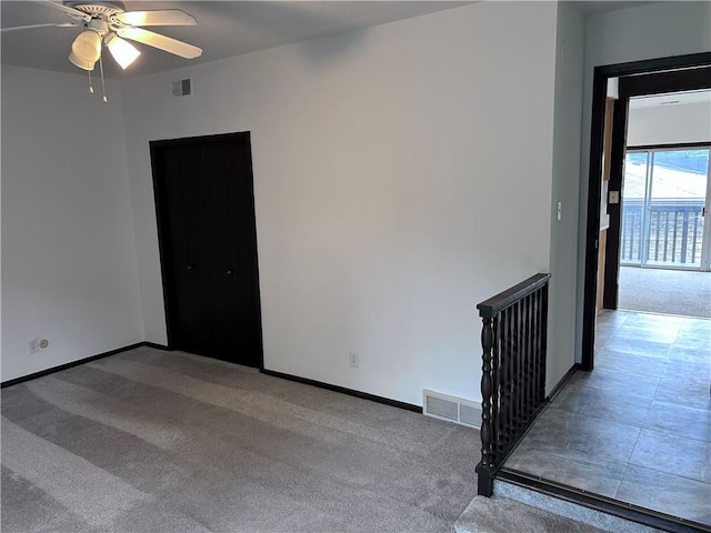 423 W 104th St Unit C, Kansas City, MO 64114 - spare room with ceiling fan and carpet floors
