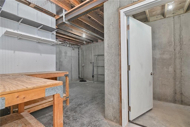 14500 Aurora Ln, Basehor, KS 66007 - unfinished basement with a workshop area