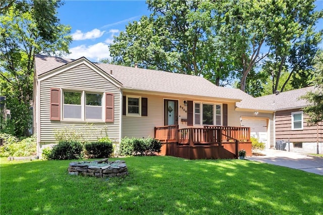 5706 Beverly Ave, Mission, KS 66202 - ranch-style house with an attached garage, a front lawn, and concrete driveway