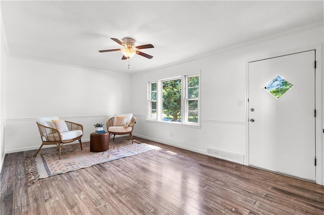 5706 Beverly Ave, Mission, KS 66202 - sitting room with crown molding, a ceiling fan, and wood finished floors