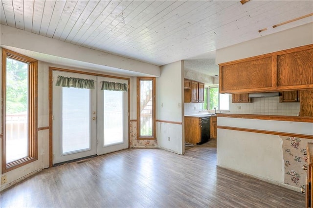18120 E 25th Ter, Independence, MO 64057 - kitchen featuring french doors, brown cabinetry, wood ceiling, light wood finished floors, and light countertops