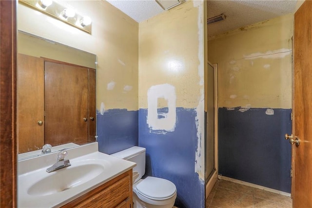18120 E 25th Ter, Independence, MO 64057 - full bath with a stall shower, a textured ceiling, vanity, and tile patterned flooring