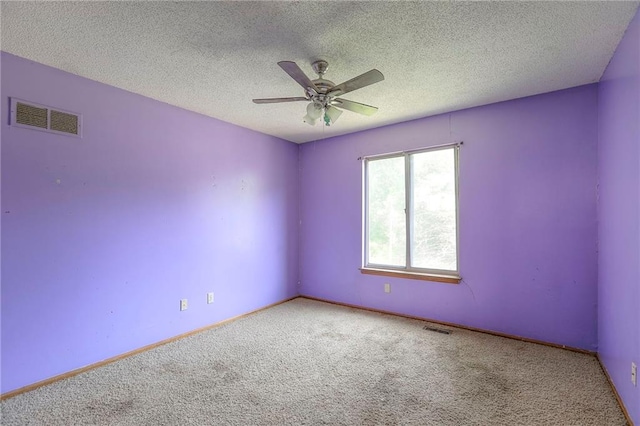 18120 E 25th Ter, Independence, MO 64057 - carpeted empty room featuring a ceiling fan and a textured ceiling