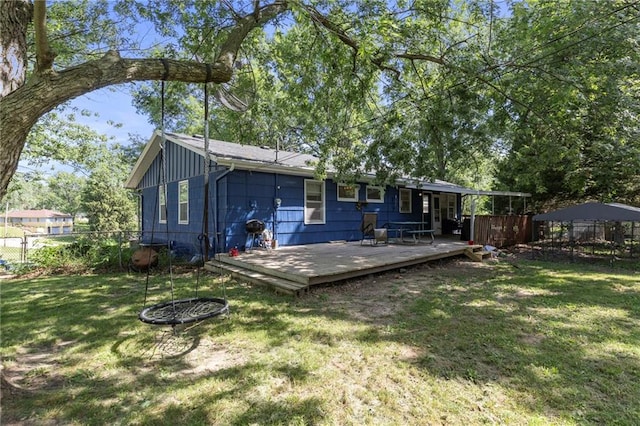 2206 N 73rd Ter, Kansas City, KS 66109 - back of house with a deck