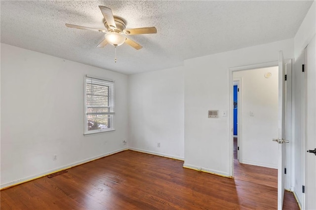 2206 N 73rd Ter, Kansas City, KS 66109 - unfurnished room featuring wood finished floors, a textured ceiling, and a ceiling fan