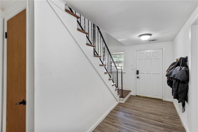 2206 N 73rd Ter, Kansas City, KS 66109 - foyer with wood finished floors and stairway