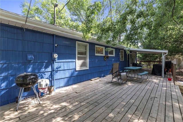 2206 N 73rd Ter, Kansas City, KS 66109 - wooden deck featuring outdoor dining space and grilling area