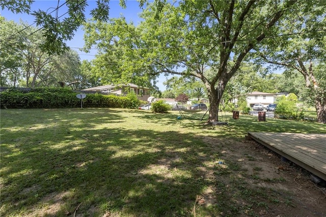 2206 N 73rd Ter, Kansas City, KS 66109 - view of grassy yard with a wooden deck