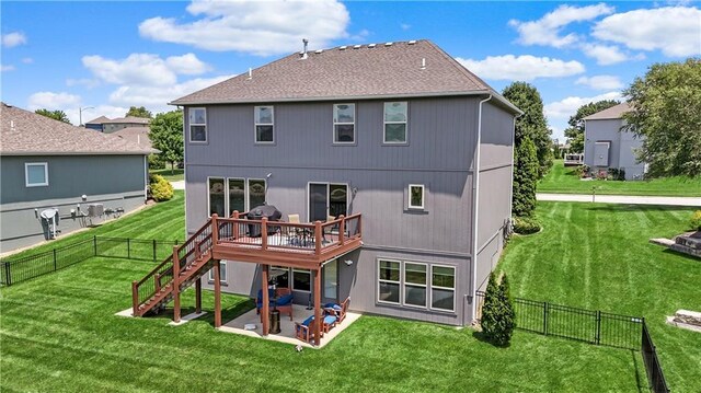 1216 Hillmann Ln, Warrensburg, MO 64093 - back of house featuring a wooden deck, a patio, stairs, and a fenced backyard