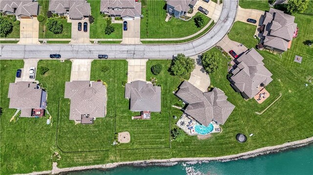 1216 Hillmann Ln, Warrensburg, MO 64093 - aerial overview of property's location with nearby suburban area and a nearby body of water