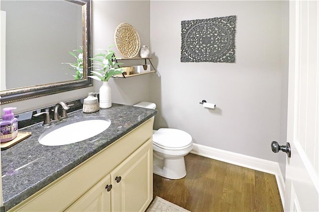 1216 Hillmann Ln, Warrensburg, MO 64093 - bathroom featuring vanity and wood finished floors