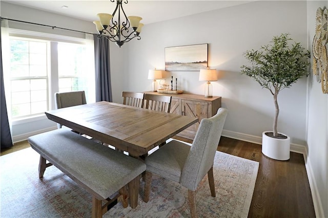 1216 Hillmann Ln, Warrensburg, MO 64093 - dining room featuring a chandelier, plenty of natural light, and wood finished floors