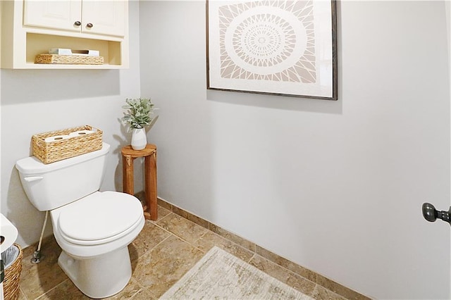 1216 Hillmann Ln, Warrensburg, MO 64093 - bathroom with baseboards and stone finish flooring