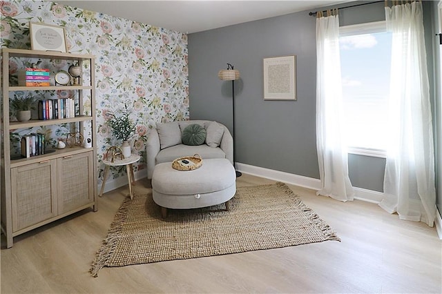 1216 Hillmann Ln, Warrensburg, MO 64093 - sitting room featuring wallpapered walls and light wood-type flooring