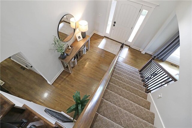 1216 Hillmann Ln, Warrensburg, MO 64093 - entrance foyer with wood finished floors and stairway
