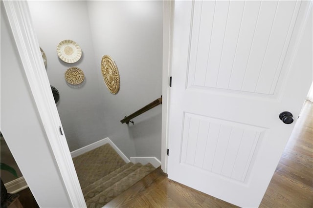 1216 Hillmann Ln, Warrensburg, MO 64093 - staircase with wood finished floors and baseboards