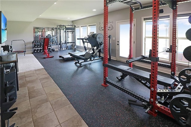 1216 Hillmann Ln, Warrensburg, MO 64093 - gym featuring french doors and recessed lighting