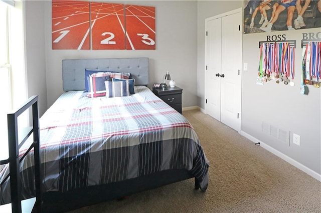 1216 Hillmann Ln, Warrensburg, MO 64093 - bedroom with carpet flooring and a closet