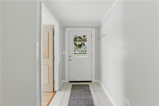814 S Saville St, Independence, MO 64052 - doorway with light tile patterned flooring