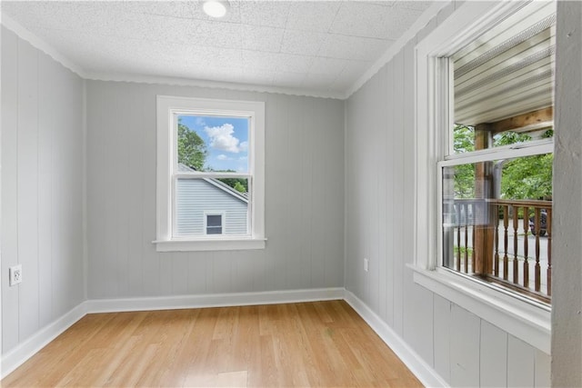 814 S Saville St, Independence, MO 64052 - spare room with light wood-style floors and baseboards