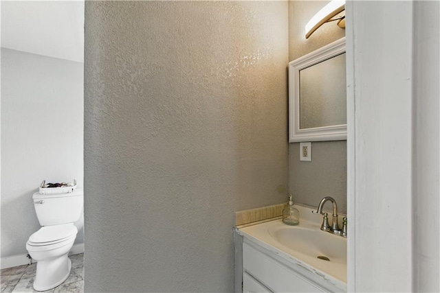 814 S Saville St, Independence, MO 64052 - half bath featuring vanity and a textured wall