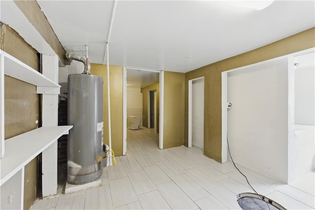 814 S Saville St, Independence, MO 64052 - basement featuring gas water heater