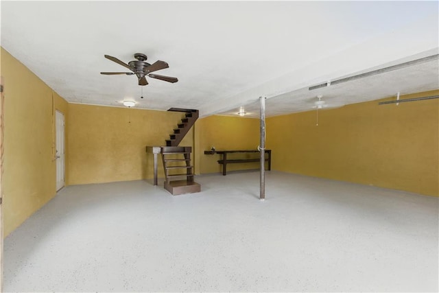814 S Saville St, Independence, MO 64052 - finished below grade area featuring a ceiling fan and stairs