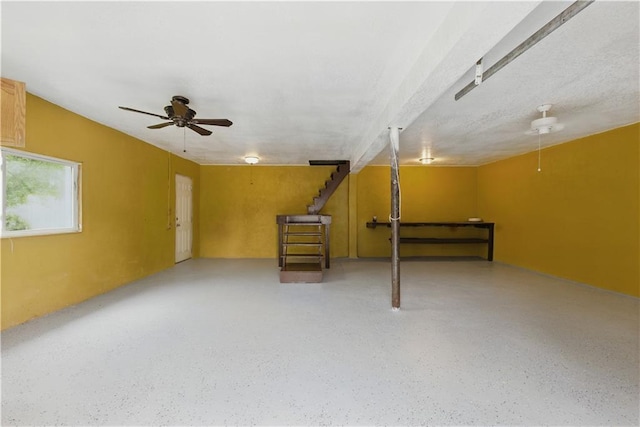 814 S Saville St, Independence, MO 64052 - below grade area with stairs and a ceiling fan