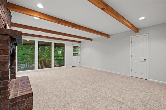 12343 Pinehurst Dr, Kansas City, KS 66109 - unfurnished living room with carpet flooring, beam ceiling, recessed lighting, and a brick fireplace