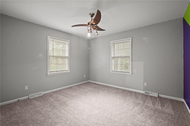 12343 Pinehurst Dr, Kansas City, KS 66109 - unfurnished room with ceiling fan and carpet flooring