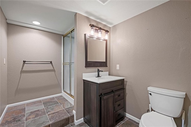 12343 Pinehurst Dr, Kansas City, KS 66109 - bathroom with vanity, an enclosed shower, and stone finish flooring