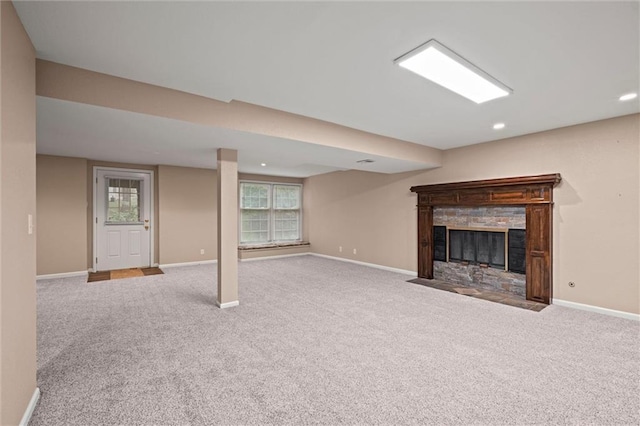 12343 Pinehurst Dr, Kansas City, KS 66109 - basement featuring carpet, a fireplace with flush hearth, and recessed lighting
