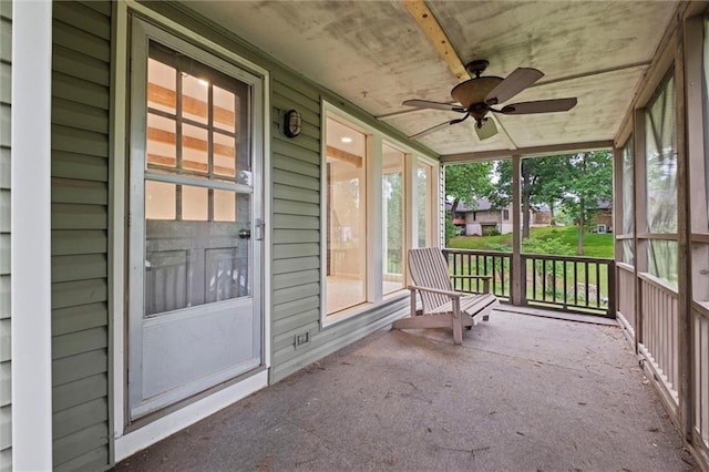 12343 Pinehurst Dr, Kansas City, KS 66109 - unfurnished sunroom featuring ceiling fan