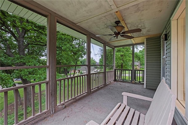 12343 Pinehurst Dr, Kansas City, KS 66109 - unfurnished sunroom featuring a ceiling fan