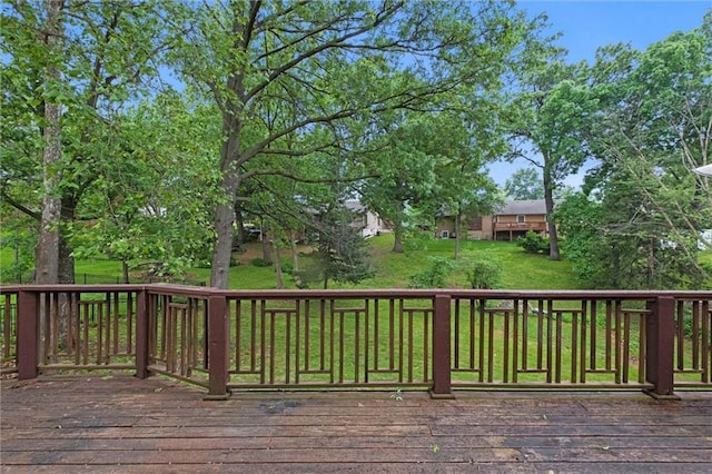 12343 Pinehurst Dr, Kansas City, KS 66109 - wooden deck featuring a yard