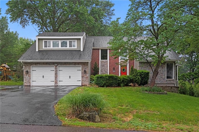 12343 Pinehurst Dr, Kansas City, KS 66109 - tri-level home featuring stone siding, driveway, and a front yard