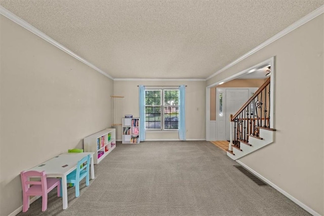 10601 Reeder St, Overland Park, KS 66214 - game room featuring a textured ceiling, crown molding, and carpet floors