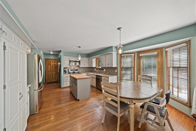 10601 Reeder St, Overland Park, KS 66214 - dining room with light wood-style floors