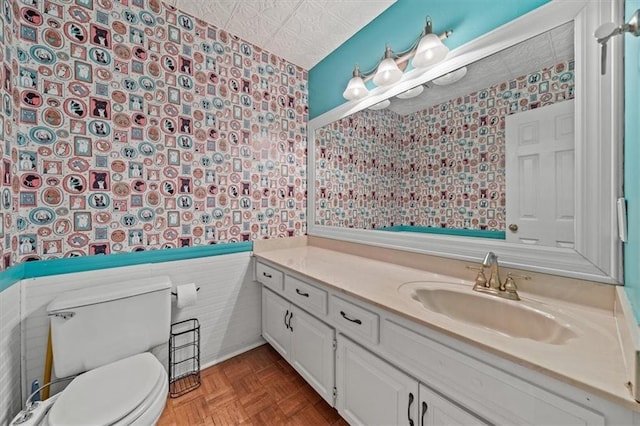 10601 Reeder St, Overland Park, KS 66214 - bathroom featuring vanity and wallpapered walls