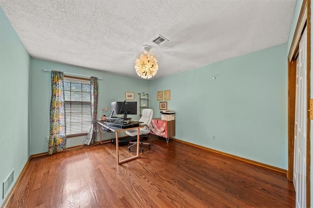 10601 Reeder St, Overland Park, KS 66214 - office with wood finished floors, a textured ceiling, and a chandelier