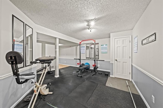 10601 Reeder St, Overland Park, KS 66214 - exercise area featuring a textured ceiling