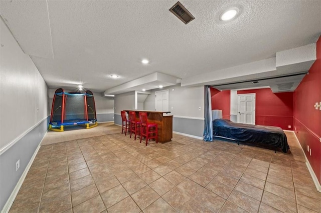 10601 Reeder St, Overland Park, KS 66214 - community lobby featuring a textured ceiling