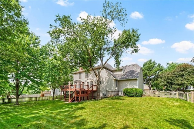 10601 Reeder St, Overland Park, KS 66214 - rear view of property featuring a deck, stairs, and a fenced backyard